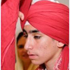 Guransh Singh knelt at the altar of Guru Granth Sahib as the granthi (elder) and uncles unfurled yards of a salmon-colored fabric. His family and friends, ... - guransh-thmnl